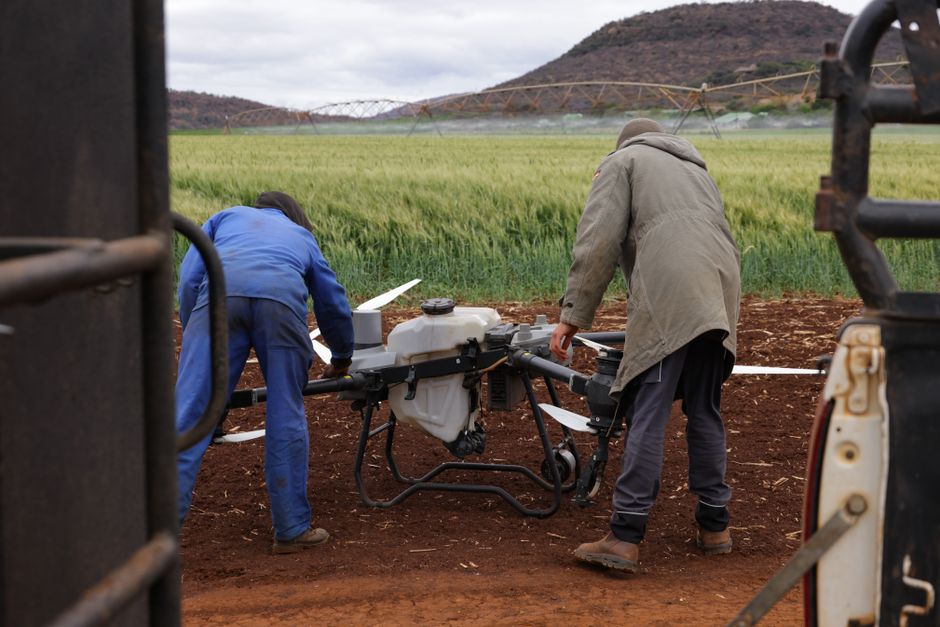 Aerial view of a gravel yard showcasing stockpile measurement using drones for accurate inventory management.